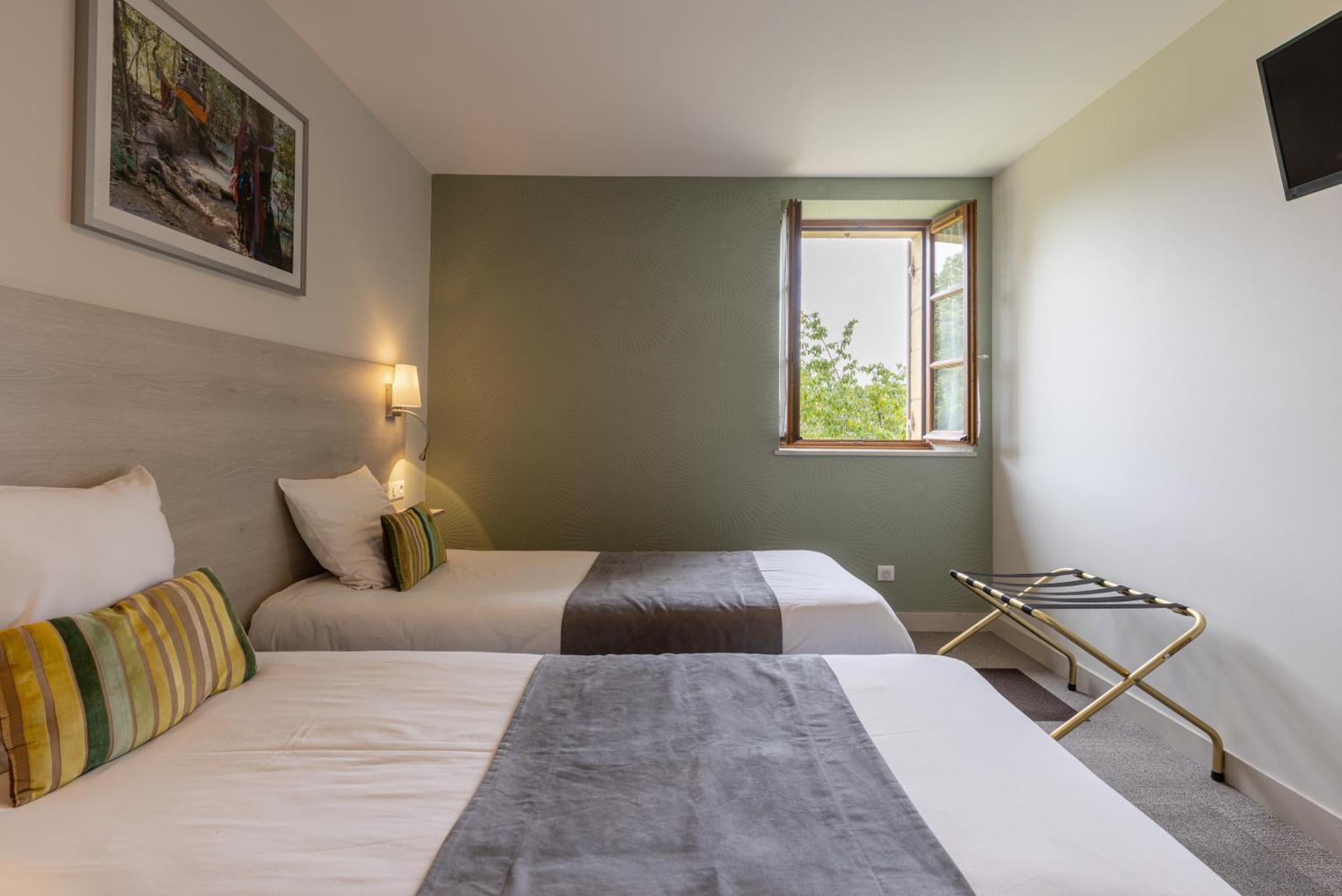 Logis Hotel Archambeau Thonac Eksteriør bilde